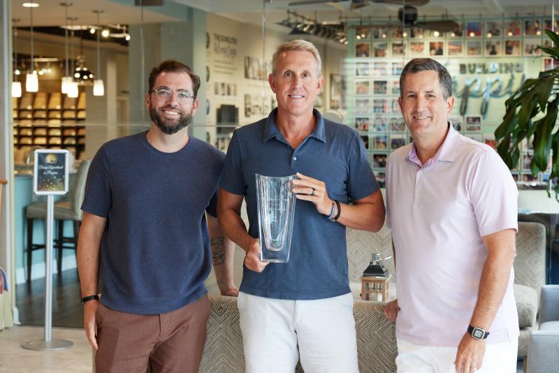 Schell Brothers has been named the 2023 Builder of the Year by national publication Pro Builder Magazine. Shown during a ceremony in August are (l-r) Pro Builder Magazine Editor James McClister, Schell Brothers CEO Chris Schell and Pro Builder Magazine Editorial Director Rich Binsacca. SUBMITTED PHOTO